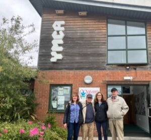 Green councillor Jules Wood with local residents and a representative from the YMCA'